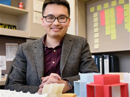 Folding Intelligent Machines: Exploiting Geometry and Mechanics of Origami to Build Intelligence in the Mechanical Domain